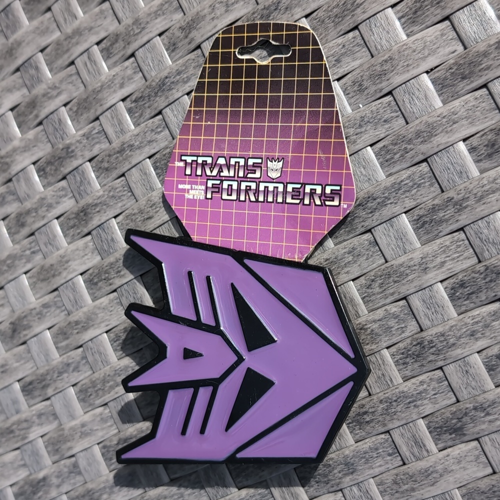 Transformers belt buckle